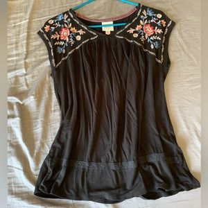 Black floral embroidered pattern with lace trim at the bottom